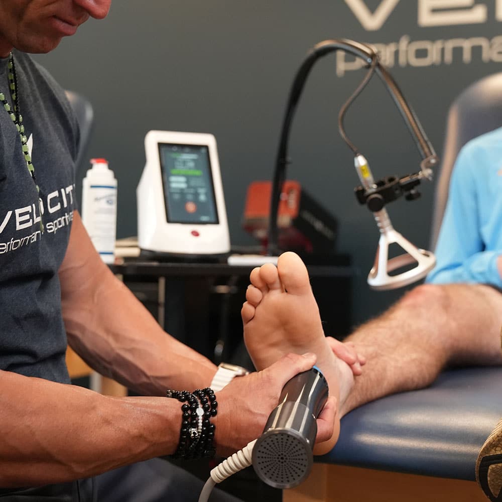 Dual therapy session for chronic pain and soft tissue damage.
