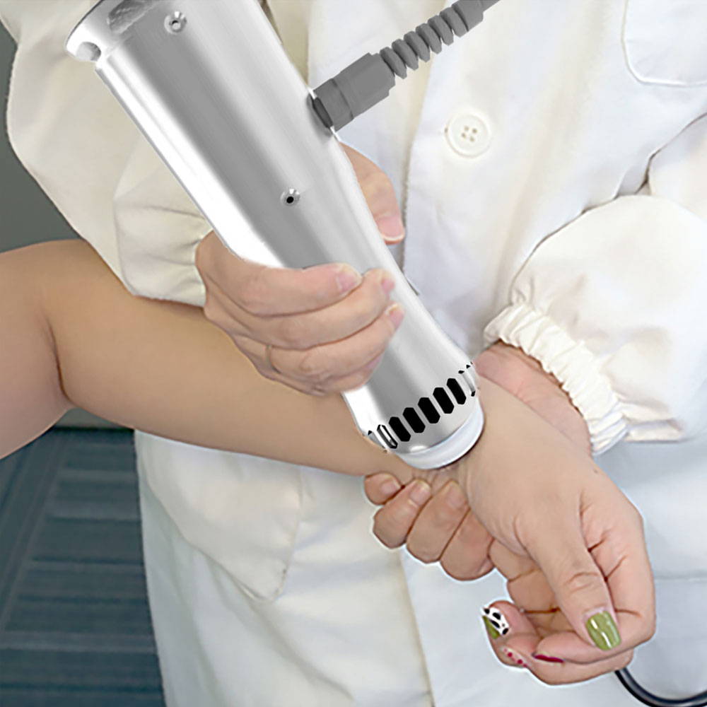 Shockwave therapy applied to forearm and wrist.